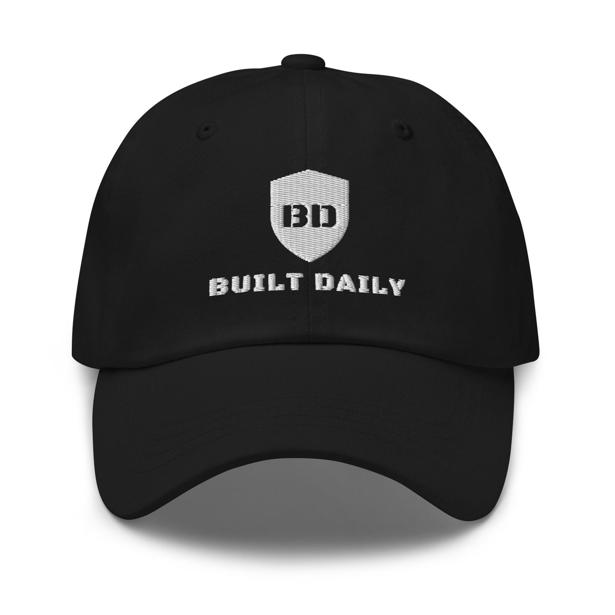 Built Daily Shield Cap: dad hat with the embroidered Built Daily shield on the front