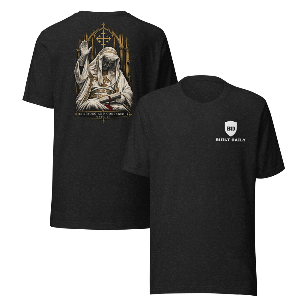 Black Built Daily tee: King Baldwin IV in white robes and iron mask before a gold Jerusalem cross, with BE STRONG AND COURAGEOUS, Joshua 1:9